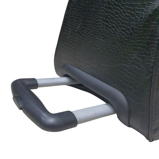 Black duffle bag with trolley wheel and telescopic handle.